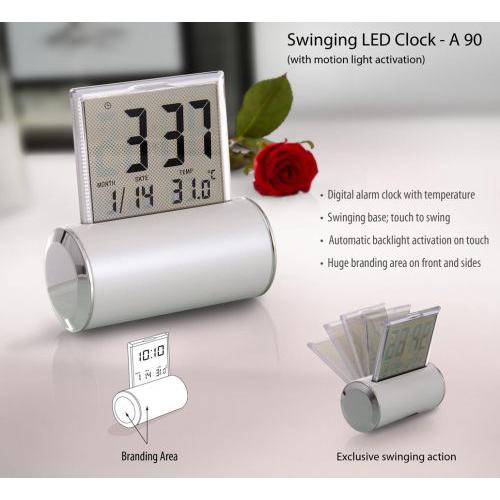 Swing clock with motion light