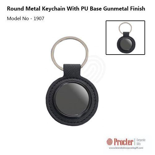 Round metal keychain with PU base J68